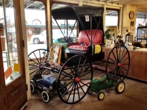 old horse drawn buggy in black and red