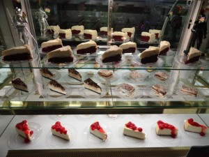 Desserts such as cheesecake with cherries, Red velvet cake and mudpies.