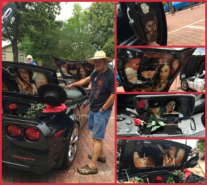 black corvette with painted pictures.